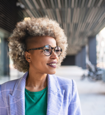 Nonprofit leader feeling confident after her coaching session on leadership transition