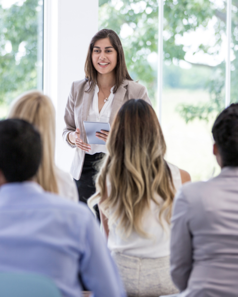 Team lead engaging with stakeholders {{brizy_dc_image_alt imageSrc=