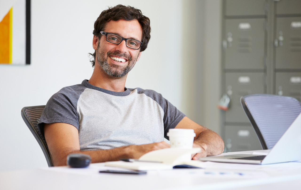 Coaching client thinks about progress toward his goals