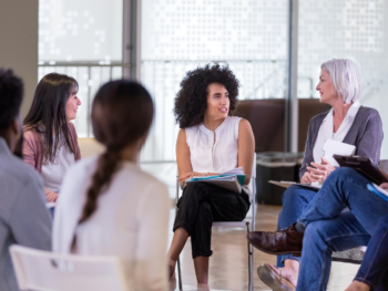 Nonprofit staff participate in a community listening circle