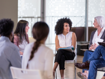 Nonprofit staff participate in a community listening circle